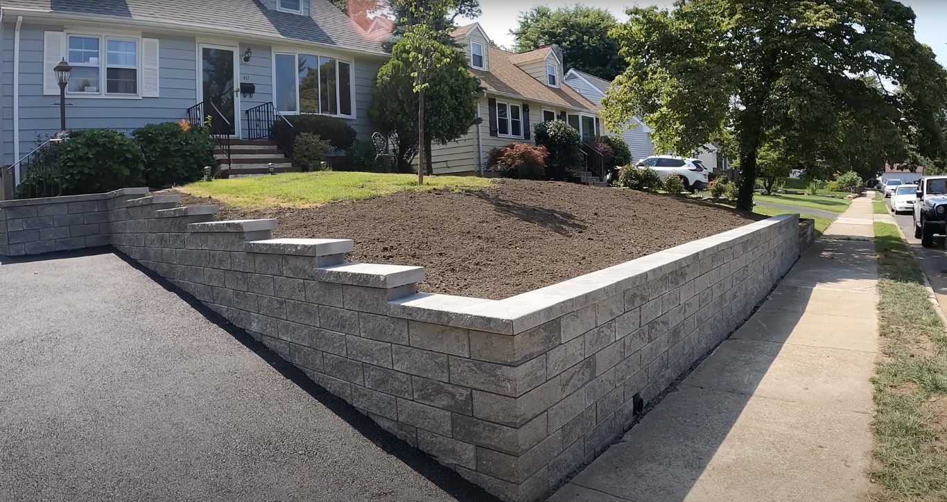 Retaining wall and concrete masonry for landscape support